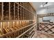 Custom wine cellar with wooden racks, designed to store a large collection of wines in a climate-controlled environment at 1404 Barony Lake Way, Raleigh, NC 27614