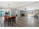 Open living area with fireplace, adjoined to the kitchen and dining area, offering a spacious layout at 1425 Country Pond Ln, Willow Springs, NC 27592