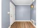 The entryway features wood floors and neutral walls, with a pendant light at 1506 N Mebane St, Burlington, NC 27217