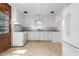 Bright kitchen with white cabinets and tile flooring at 1506 N Mebane St, Burlington, NC 27217