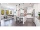 Modern kitchen with stainless steel appliances, a center island, and pendant lighting at 1515 Spring Overlook Ln, Hillsborough, NC 27278