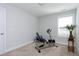 Home gym equipped with stationary bike, yoga ball, and hardwood floors at 1613 Osprey Ridge Dr, Willow Springs, NC 27592