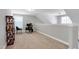 Versatile loft space offers a comfortable place for work with desk and chairs at 1613 Osprey Ridge Dr, Willow Springs, NC 27592