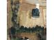 Image showing the property boundary lines for this lot, surrounded by trees at 1613 Osprey Ridge Dr, Willow Springs, NC 27592