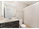 Bathroom featuring a vanity, toilet, shower with patterned curtain, and neutral walls at 19 Tobenton Ct, Clayton, NC 27520