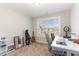 Brightly lit bedroom offers great natural light and ample room for a home office at 19 Tobenton Ct, Clayton, NC 27520