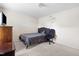 Bedroom featuring carpet, neutral walls, writing on the wall, bed, desk chair, and dresser at 1945 Red Quartz Dr, Raleigh, NC 27610