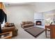 Inviting living room with a fireplace, plush seating, and warm decor at 1945 Red Quartz Dr, Raleigh, NC 27610