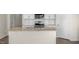 Bright kitchen features white cabinets, subway tile backsplash, stainless appliances, and granite countertops at 195 Hawksmoore Ln, Lillington, NC 27546
