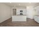 Bright kitchen features white cabinets, subway tile backsplash, stainless appliances, and granite countertops at 195 Hawksmoore Ln, Lillington, NC 27546