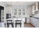 Bright kitchen featuring a large island, modern appliances, and ample counter space at 2011 Trident Maple Ln, Chapel Hill, NC 27517