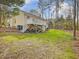 Serene backyard with a tiered deck, ideal for enjoying the peaceful surroundings and outdoor gatherings at 204 Sugarland Dr, Apex, NC 27502