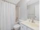 Neat bathroom with shower, toilet, sink and mirror, for a tidy, efficient space at 204 Sugarland Dr, Apex, NC 27502