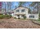 Charming home with white siding, black shutters, and a well-maintained front yard at 256 Marilyn Cir, Cary, NC 27513
