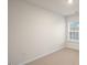Cozy bedroom featuring a large window offering natural light and neutral carpeting at 261 Canopy Dr, Graham, NC 27253