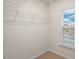 Walk in closet with wire shelving and a window at 261 Canopy Dr, Graham, NC 27253