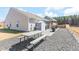 Backyard showcasing a picnic table, storage shed, wooden pergola, and barbeque grill at 31 Harrow Ter, Roxboro, NC 27574