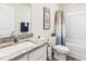 Granite vanity in a bathroom featuring new sink, toilet, and bathtub at 31 Harrow Ter, Roxboro, NC 27574