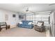 Spacious garage with a comfortable seating area, perfect for hobbies and relaxation at 31 Harrow Ter, Roxboro, NC 27574