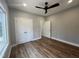 Bedroom featuring recessed lighting, hardwood floors, large window, and double door closet at 3273 Argyll Dr, Sanford, NC 27332