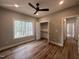 Bedroom featuring recessed lighting, hardwood floors, walk-in closet, and a large window at 3273 Argyll Dr, Sanford, NC 27332