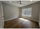 Bedroom featuring recessed lighting, ceiling fan, large window, and hardwood flooring at 3273 Argyll Dr, Sanford, NC 27332