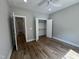 Bedroom featuring recessed lighting, ceiling fan, hardwood floors, and walk-in closet at 3273 Argyll Dr, Sanford, NC 27332