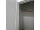 A closet with gray interior and white trim is seen, including wood-look flooring and ample shelf space at 3273 Argyll Dr, Sanford, NC 27332