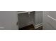 A closet with gray interior and white trim is seen, including wood-look flooring and ample shelf space at 3273 Argyll Dr, Sanford, NC 27332