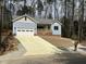 Lovely single-story home with covered porch, garage, and newly graveled driveway at 3273 Argyll Dr, Sanford, NC 27332