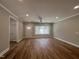 Large living room with a bright window and views of the front yard and entryway at 3273 Argyll Dr, Sanford, NC 27332