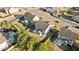 Aerial view of a property showcasing the fenced backyard, patio area, and nearby neighborhood at 3541 Fairstone Rd, Wake Forest, NC 27587