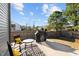 Relaxing backyard featuring a patio with seating, a grill, and ample space for outdoor activities at 3541 Fairstone Rd, Wake Forest, NC 27587