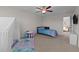 Bedroom with a bed, play area, and carpeted floors at 3541 Fairstone Rd, Wake Forest, NC 27587