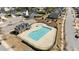 A clean community pool and playground are surrounded by landscaping and residences at 3541 Fairstone Rd, Wake Forest, NC 27587