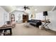 Cozy bonus room with vaulted ceilings, comfortable seating, and a ceiling fan at 3655 Pleasants Ridge Dr, Wake Forest, NC 27587