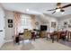 Bright craft room with multiple sewing stations, comfortable seating, and natural light from the window at 3655 Pleasants Ridge Dr, Wake Forest, NC 27587