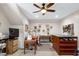 Spacious craft room featuring multiple sewing machines, crafting tables, and ample storage cabinets at 3655 Pleasants Ridge Dr, Wake Forest, NC 27587