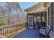 Lovely deck overlooking a lush, wooded backyard, with access to a screened in porch at 3655 Pleasants Ridge Dr, Wake Forest, NC 27587