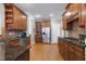 Spacious kitchen featuring stainless steel appliances, wood cabinets, and granite countertops at 3655 Pleasants Ridge Dr, Wake Forest, NC 27587