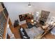 A bright open-concept living space with hardwood floors and lots of seating at 3655 Pleasants Ridge Dr, Wake Forest, NC 27587