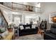 Comfortable living room with high ceilings, a fireplace, and an open floor plan at 3655 Pleasants Ridge Dr, Wake Forest, NC 27587