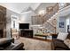Comfortable living room with fireplace, staircase, TV, sofa, chairs, and accent rug at 3655 Pleasants Ridge Dr, Wake Forest, NC 27587