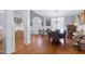 Open concept living featuring both a formal dining area and stately column supports at 3655 Pleasants Ridge Dr, Wake Forest, NC 27587