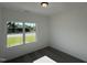 Bedroom with neutral carpet, a single window, and white walls at 380 Pecan Valley Way, Four Oaks, NC 27524