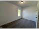 Bedroom with carpeted flooring, and a bright window overlooking the outdoor scenery at 380 Pecan Valley Way, Four Oaks, NC 27524