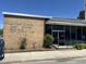 The Four Oaks Post Office, providing postal services for the community with a classic brick facade at 380 Pecan Valley Way, Four Oaks, NC 27524