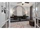 Bright home office featuring an artistic arch, modern desks, and comfortable seating at 408 Providence Spring Ln, Fuquay Varina, NC 27526