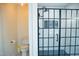 Modern bathroom featuring a glass-enclosed shower and toilet at 48 Blue Heron Ln, Roxboro, NC 27574