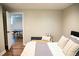 Bedroom with a daybed and a view of the game room through an open doorway at 48 Blue Heron Ln, Roxboro, NC 27574